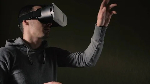 Man wearing virtual reality headset at living room. Stock Footage 74385618