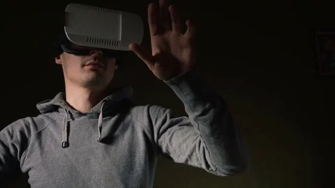 Man wearing virtual reality headset at living room. Stock Footage 74385698