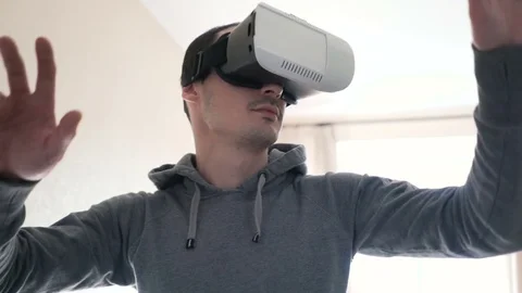 Man wearing virtual reality headset at living room. Video stock 74435889