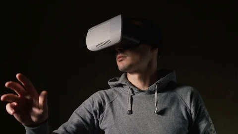 Man wearing virtual reality headset at living room. Video stock 74436011