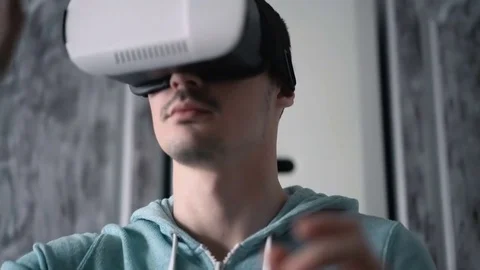 Man wearing virtual reality headset at living room. Stock Footage 74639805