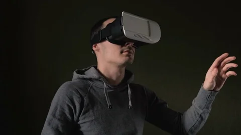 Man wearing virtual reality headset at living room. Stock Footage 74640267