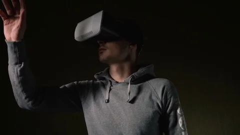 Man wearing virtual reality headset at living room. Video stock 74692365