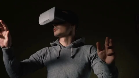 Man wearing virtual reality headset at living room. Stock Footage 74692413
