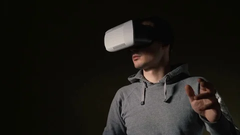 Man wearing virtual reality headset at living room. Stock Footage 74733538