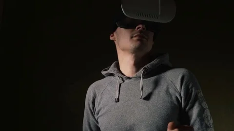 Man wearing virtual reality headset at living room. Stock Footage 74733595