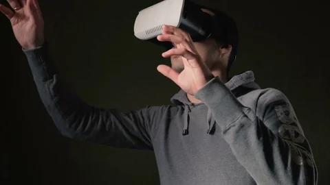 Man wearing virtual reality headset at living room. Stock Footage 74838337