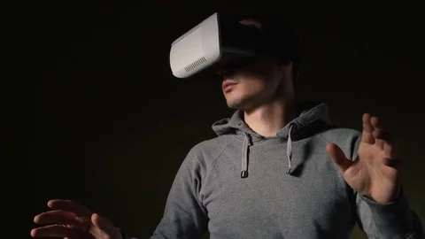 Man wearing virtual reality headset at living room. Stock Footage 74873117