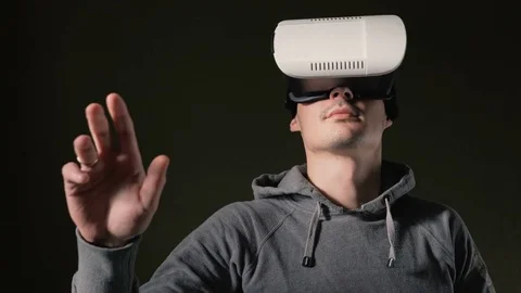 Man wearing virtual reality headset at living room. Stock Footage 74873321