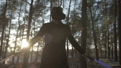 Man wearing virtual reality headset playing game 360 video the man plays with Stock Footage 84848400