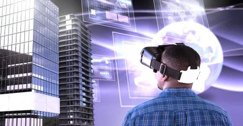 Man wearing virtual reality headset with Tall buildings with world and screens Stock Photos