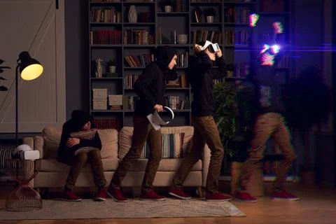 Man wearing virtual reality headset. Image with glitch effect Stock Photos