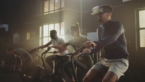 Man wearing VR glasses doing cycling Video stock 236189543