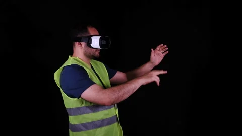 Man wearing VR glasses Stock Footage 257698428