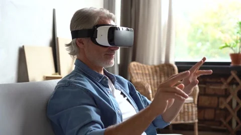 Man wearing VR headset. Handsome man resting use VR glasses. New technologies Stock Footage 141186327