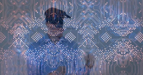 Man wearing VR headset interacting in tech lab displaying holographic circuit Stock Footage 307448474