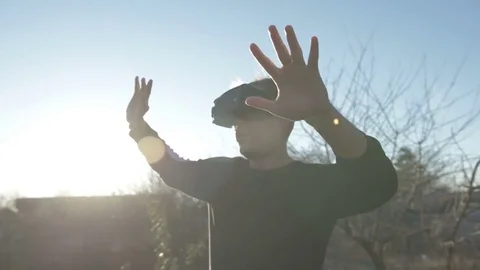 Man Wearing VR Headset at nature. Stock Footage 84846586