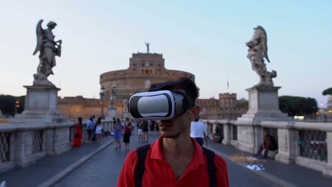 Man Wearing VR Headset on Ponte Sant'Angelo, Rome, Italy. Technology concept. Stock Footage 80179528