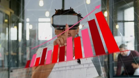 Man wearing VR headset raising hand and pointing, 3D bar chart responding to Stock Footage 332804877