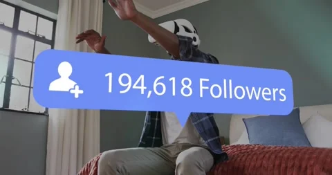 Man wearing VR headset reaching toward hovering follower count panel, causing Stock Footage 319678996