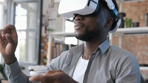 Man wearing VR headset. Using gestures with hands. Stock Footage 116344100