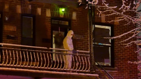 Man wearing white suit during coronavirus pandemic Stock Footage 127050119