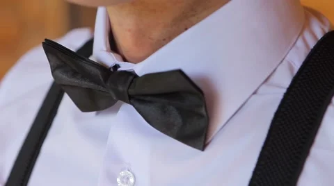 A man wears a bow tie Video stock 55545043