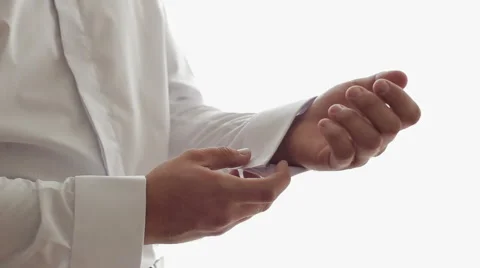 Man wears cufflinks Stock Footage 61710856