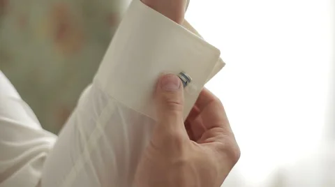 Man wears cufflinks Stock-Footage 61710882