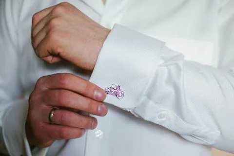 Man wears cufflinks Stock Photos