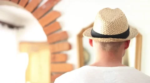 Man wears a hat Stock Footage 62803078