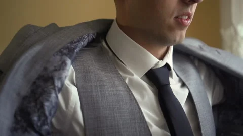 A man wears a jacket and tie Stock Footage 167785657