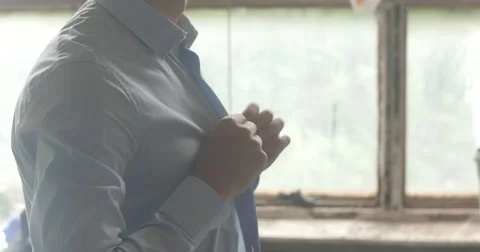 The man wears a shirt. Stock Footage 52273474