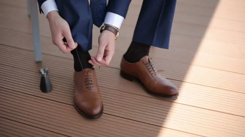 The man wears shoes. Close up Stock Footage 44567212