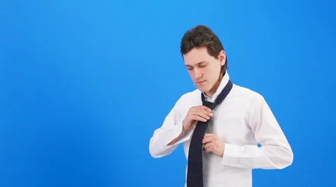 Man wears a tie Stock Footage 8561170
