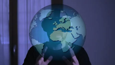 Man wears vr goggles and looks at world map in augmented reality. Metaverse conc Video stock 165170228