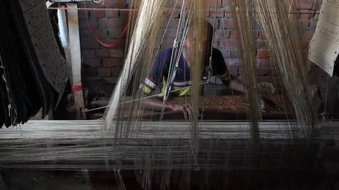 Man weaving fabric Stock Footage 94570476