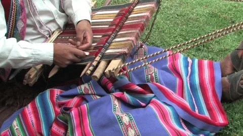 Man weaving a rug in Peru Stock Footage 291692