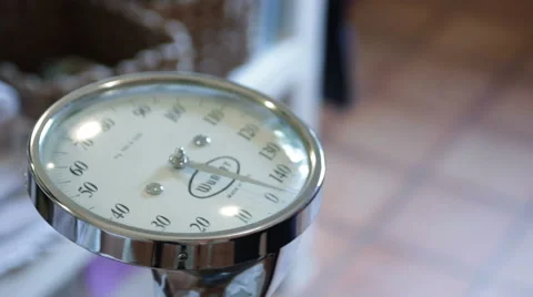 Man weighing himself Stock Footage 40844409