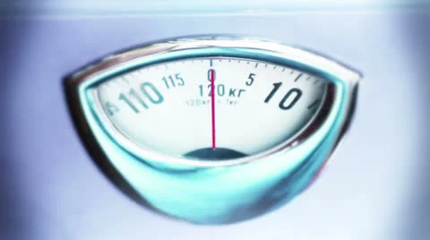 Man weighting on scale Stock Footage 26402273