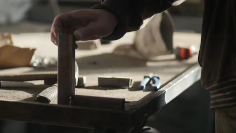 A man  weld a metal construction Stock Footage 130711025