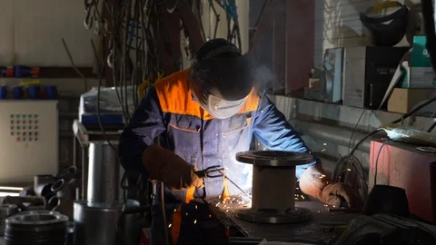Man welder working with metal Stock Footage 120495802