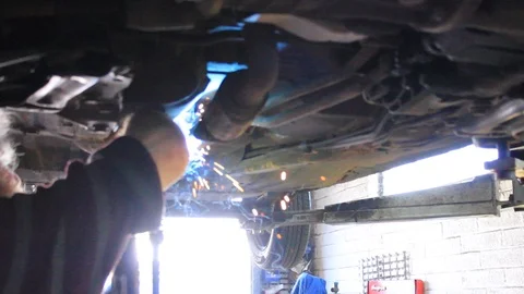 Man welding car Stock Footage 92242663