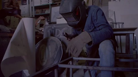 Man welding in his workshop Stock Footage 278986740