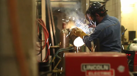 Man welding metal object Stock Footage 39722078