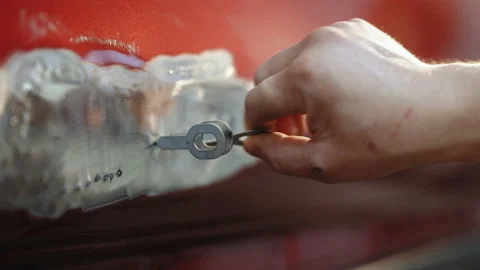 Man welding a part of the car and preparing it for a general repair welding Stock Footage 194561900
