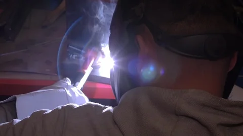 Man welding a pipe in slow motion Stock Footage 120298008