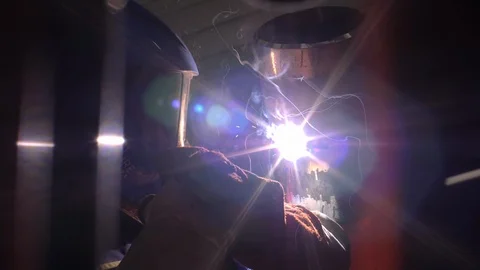 Man welding a pipe in slow motion Stock Footage 120298116