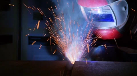 A Man is welding steel Stock Footage 54546959