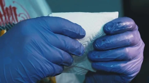 Man wet the cloth close-up Stock Footage 73150398